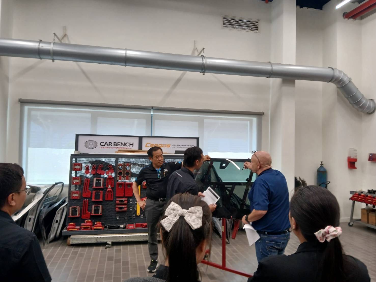 Windscreen repair process discussion during the Mercedes-Benz Thailand visit