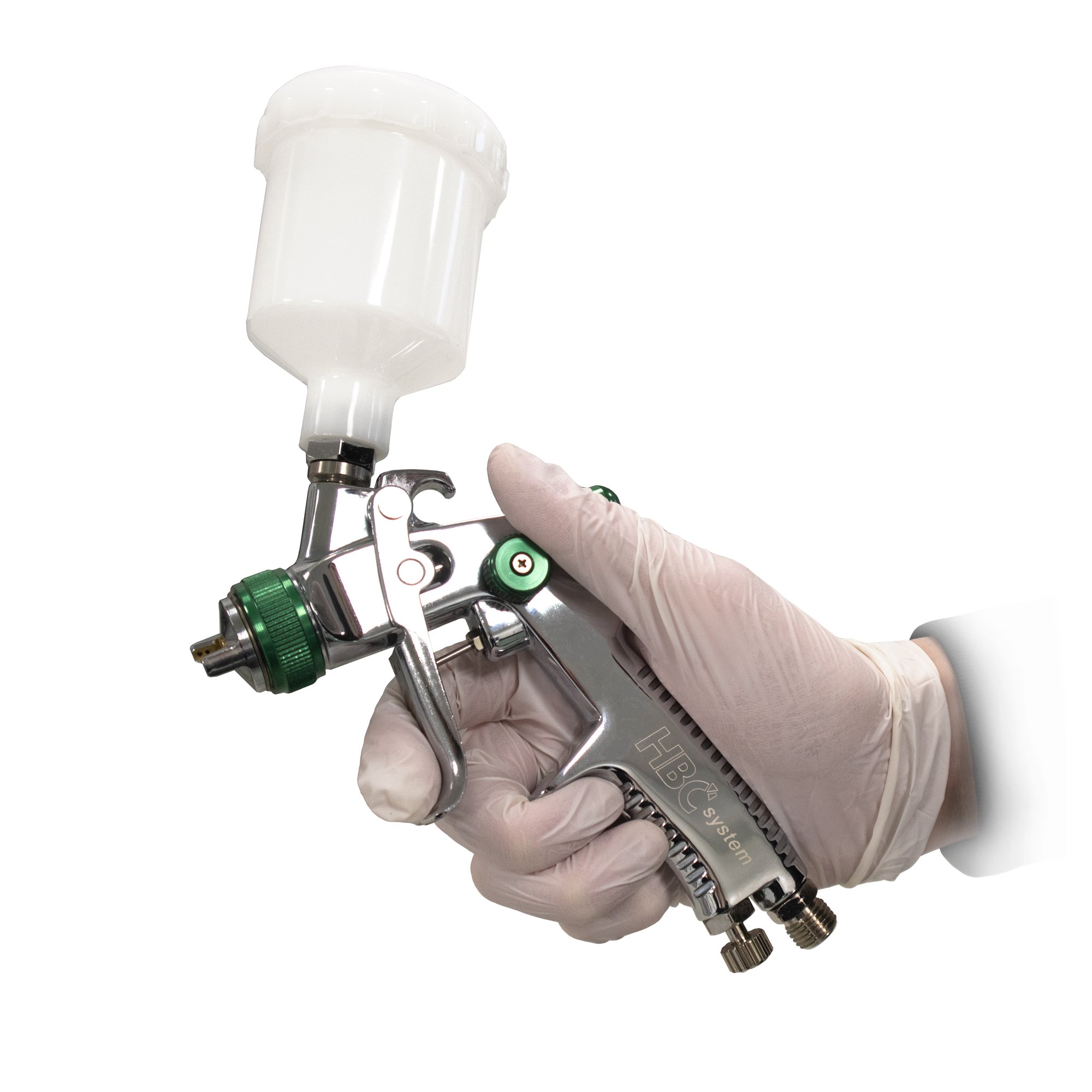 Paint gun with 1.0 nozzle shown for comparing cleaning and waste setup, workshop fit, and ownership needs.